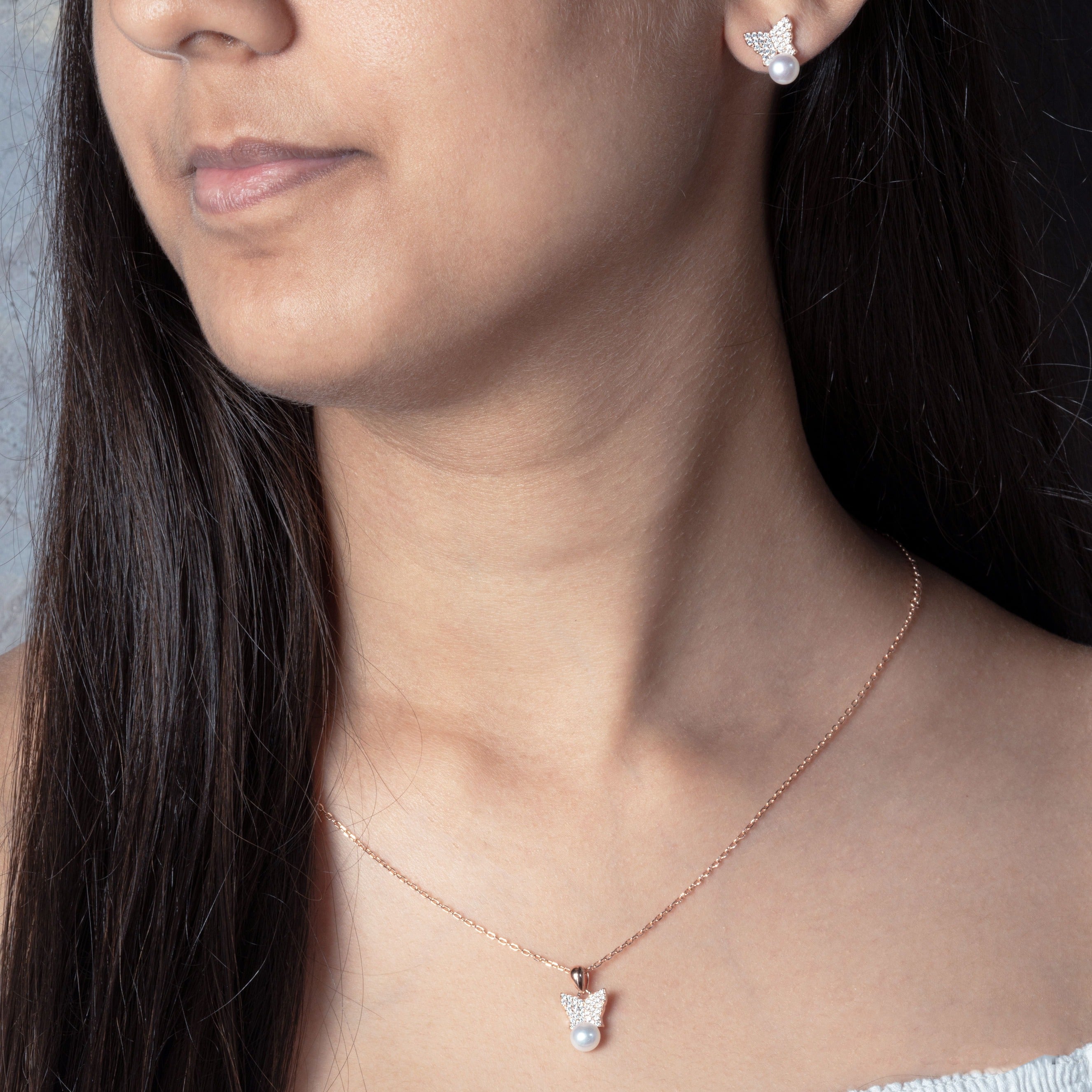 Rose gold plated Wings and Pearls pendant set