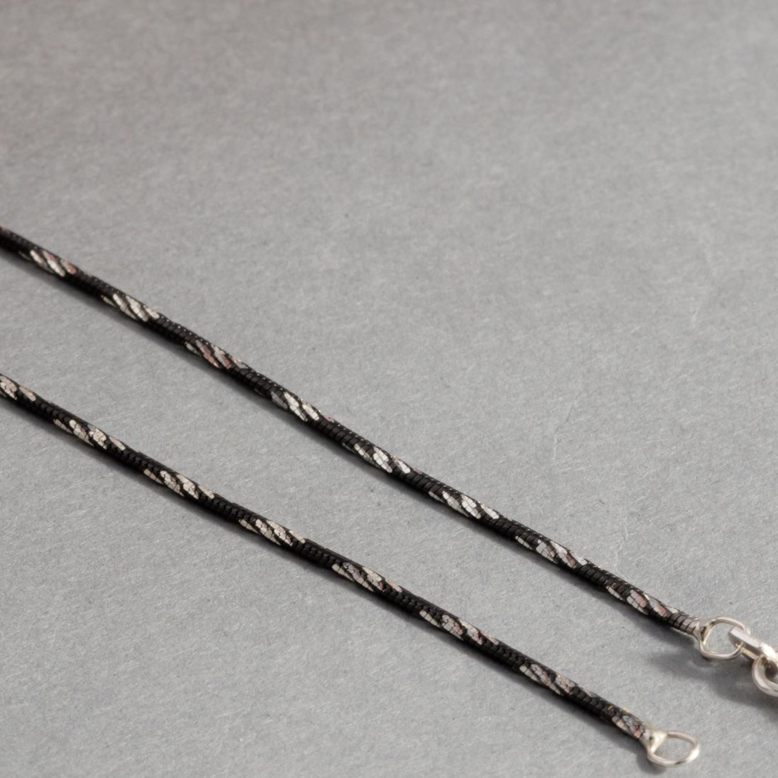 Sleek Black and Silver Anklet